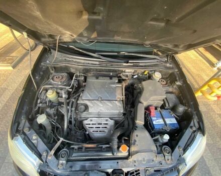 Черный Мицубиси Аутлендер, объемом двигателя 2.4 л и пробегом 219 тыс. км за 6500 $, фото 16 на Automoto.ua