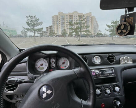 Чорний Міцубісі Аутлендер, об'ємом двигуна 2.38 л та пробігом 198 тис. км за 7100 $, фото 11 на Automoto.ua