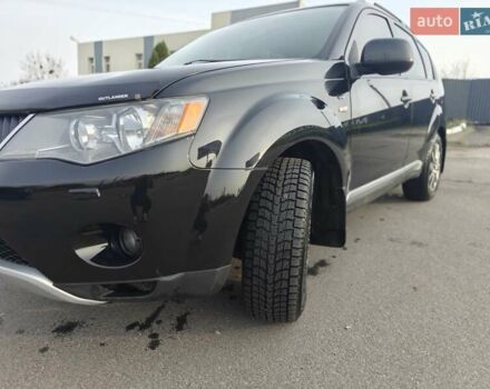 Черный Мицубиси Аутлендер, объемом двигателя 3 л и пробегом 155 тыс. км за 9800 $, фото 4 на Automoto.ua
