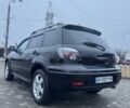 Чорний Міцубісі Аутлендер, об'ємом двигуна 2.4 л та пробігом 202 тис. км за 5800 $, фото 5 на Automoto.ua