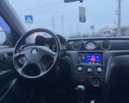 Чорний Міцубісі Аутлендер, об'ємом двигуна 2.4 л та пробігом 202 тис. км за 5800 $, фото 17 на Automoto.ua