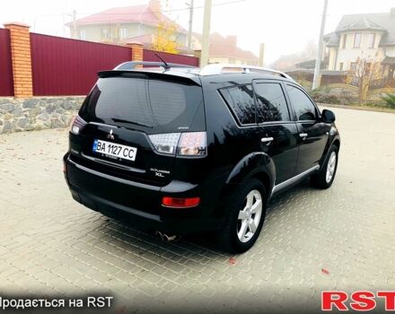 Черный Мицубиси Аутлендер, объемом двигателя 3 л и пробегом 230 тыс. км за 8999 $, фото 5 на Automoto.ua