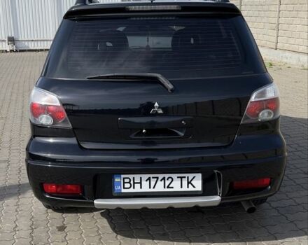 Чорний Міцубісі Аутлендер, об'ємом двигуна 2.4 л та пробігом 265 тис. км за 7000 $, фото 3 на Automoto.ua