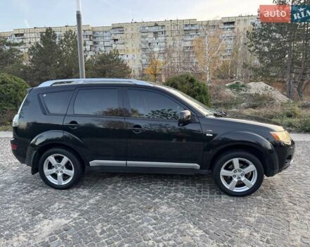 Черный Мицубиси Аутлендер, объемом двигателя 3 л и пробегом 205 тыс. км за 11300 $, фото 5 на Automoto.ua