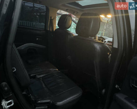 Черный Мицубиси Аутлендер, объемом двигателя 3 л и пробегом 265 тыс. км за 9200 $, фото 24 на Automoto.ua