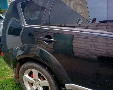 Черный Мицубиси Аутлендер, объемом двигателя 2 л и пробегом 218 тыс. км за 10500 $, фото 11 на Automoto.ua