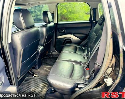 Черный Мицубиси Аутлендер, объемом двигателя 3 л и пробегом 200 тыс. км за 9799 $, фото 9 на Automoto.ua