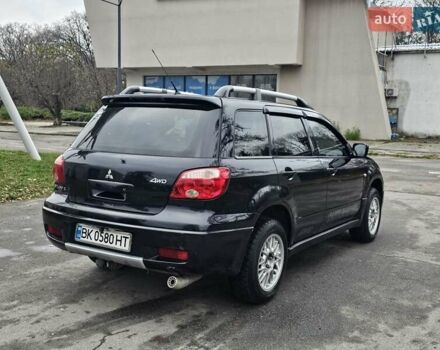 Черный Мицубиси Аутлендер, объемом двигателя 2 л и пробегом 290 тыс. км за 4000 $, фото 8 на Automoto.ua