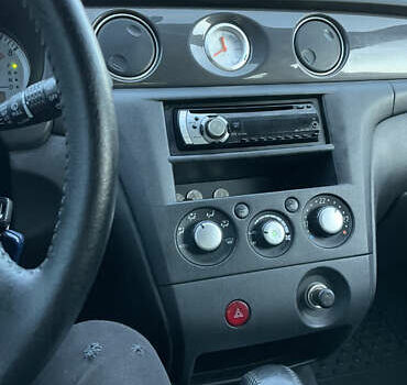 Черный Мицубиси Аутлендер, объемом двигателя 2.38 л и пробегом 118 тыс. км за 6850 $, фото 5 на Automoto.ua