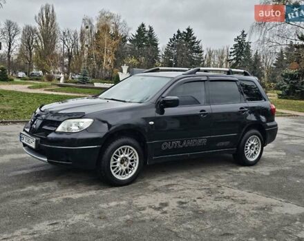 Черный Мицубиси Аутлендер, объемом двигателя 2 л и пробегом 200 тыс. км за 4900 $, фото 12 на Automoto.ua