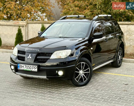Міцубісі Аутлендер 2007 у Одесі на Automoto.ua Чорний Міцубісі Аутлендер, об'ємом двигуна 2.4 л та пробігом 201 тис. км за 7700 $, фото 31 на Automoto.ua