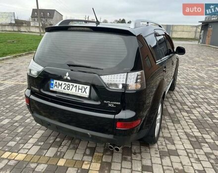 Черный Мицубиси Аутлендер, объемом двигателя 3 л и пробегом 200 тыс. км за 7999 $, фото 16 на Automoto.ua
