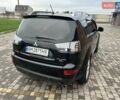 Черный Мицубиси Аутлендер, объемом двигателя 3 л и пробегом 200 тыс. км за 7999 $, фото 16 на Automoto.ua