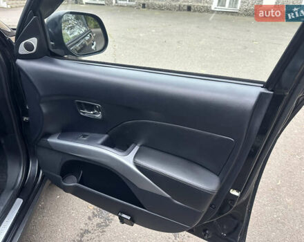 Чорний Міцубісі Аутлендер, об'ємом двигуна 2.4 л та пробігом 230 тис. км за 8300 $, фото 23 на Automoto.ua