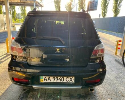 Черный Мицубиси Аутлендер, объемом двигателя 2.4 л и пробегом 219 тыс. км за 6500 $, фото 9 на Automoto.ua