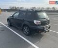 Черный Мицубиси Аутлендер, объемом двигателя 2.38 л и пробегом 180 тыс. км за 6900 $, фото 2 на Automoto.ua