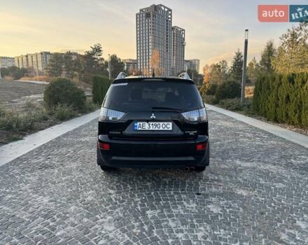 Черный Мицубиси Аутлендер, объемом двигателя 3 л и пробегом 205 тыс. км за 11300 $, фото 3 на Automoto.ua