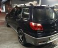 Черный Мицубиси Аутлендер, объемом двигателя 2 л и пробегом 295 тыс. км за 5300 $, фото 4 на Automoto.ua