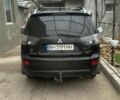 Черный Мицубиси Аутлендер, объемом двигателя 2.4 л и пробегом 240 тыс. км за 8500 $, фото 2 на Automoto.ua