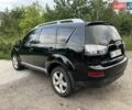 Чорний Міцубісі Аутлендер, об'ємом двигуна 3 л та пробігом 260 тис. км за 10700 $, фото 2 на Automoto.ua