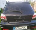 Міцубісі Аутлендер 2007 у Львові на Automoto.ua Чорний Міцубісі Аутлендер, об'ємом двигуна 2.4 л та пробігом 295 тис. км за 6800 $, фото 12 на Automoto.ua