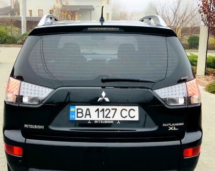 Черный Мицубиси Аутлендер, объемом двигателя 3 л и пробегом 230 тыс. км за 8999 $, фото 4 на Automoto.ua