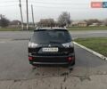 Черный Мицубиси Аутлендер, объемом двигателя 3 л и пробегом 155 тыс. км за 9800 $, фото 7 на Automoto.ua