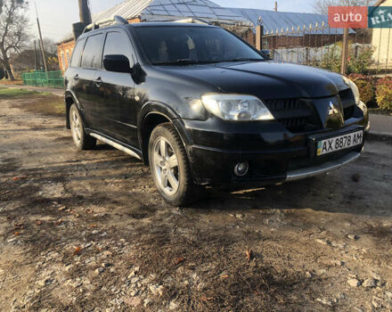 Черный Мицубиси Аутлендер, объемом двигателя 2.4 л и пробегом 260 тыс. км за 7200 $, фото 4 на Automoto.ua