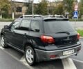Черный Мицубиси Аутлендер, объемом двигателя 2 л и пробегом 300 тыс. км за 2650 $, фото 3 на Automoto.ua