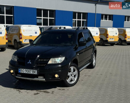 Чорний Міцубісі Аутлендер, об'ємом двигуна 2 л та пробігом 280 тис. км за 7500 $, фото 1 на Automoto.ua