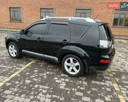 Черный Мицубиси Аутлендер, объемом двигателя 3 л и пробегом 200 тыс. км за 7999 $, фото 14 на Automoto.ua
