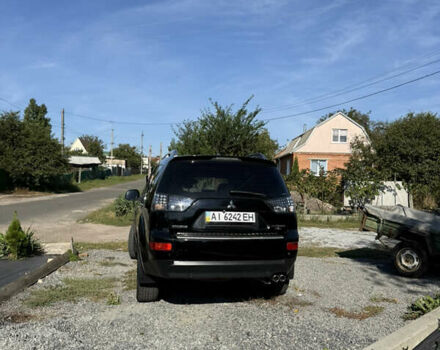 Черный Мицубиси Аутлендер, объемом двигателя 3 л и пробегом 180 тыс. км за 11200 $, фото 3 на Automoto.ua