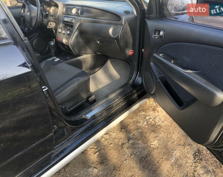 Черный Мицубиси Аутлендер, объемом двигателя 2.4 л и пробегом 260 тыс. км за 7200 $, фото 24 на Automoto.ua