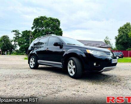 Черный Мицубиси Аутлендер, объемом двигателя 3 л и пробегом 200 тыс. км за 9799 $, фото 4 на Automoto.ua