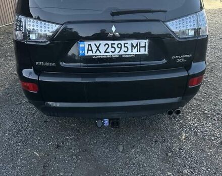 Черный Мицубиси Аутлендер, объемом двигателя 3 л и пробегом 270 тыс. км за 10600 $, фото 3 на Automoto.ua
