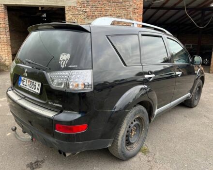 Черный Мицубиси Аутлендер, объемом двигателя 2.2 л и пробегом 190 тыс. км за 4800 $, фото 1 на Automoto.ua