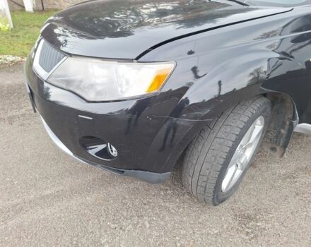 Черный Мицубиси Аутлендер, объемом двигателя 3 л и пробегом 220 тыс. км за 9000 $, фото 7 на Automoto.ua