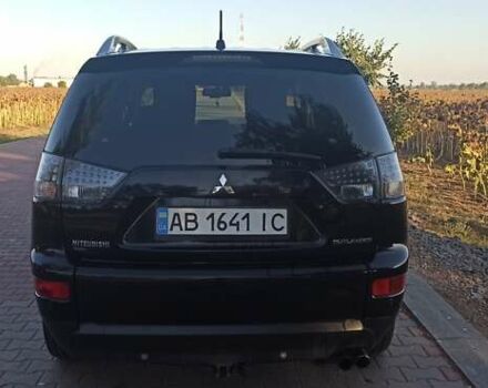 Черный Мицубиси Аутлендер, объемом двигателя 1.97 л и пробегом 244 тыс. км за 9000 $, фото 3 на Automoto.ua