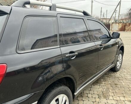 Чорний Міцубісі Аутлендер, об'ємом двигуна 2 л та пробігом 220 тис. км за 6299 $, фото 14 на Automoto.ua