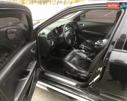 Черный Мицубиси Аутлендер, объемом двигателя 2.38 л и пробегом 314 тыс. км за 5000 $, фото 7 на Automoto.ua