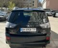 Черный Мицубиси Аутлендер, объемом двигателя 3 л и пробегом 171 тыс. км за 9000 $, фото 6 на Automoto.ua