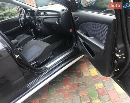 Черный Мицубиси Аутлендер, объемом двигателя 2 л и пробегом 284 тыс. км за 4999 $, фото 5 на Automoto.ua