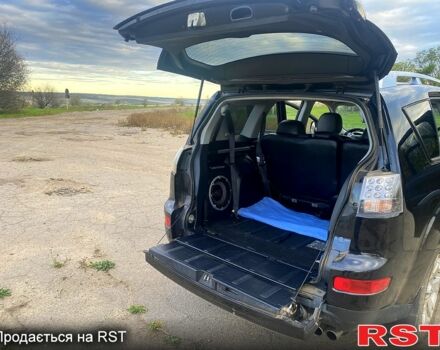 Черный Мицубиси Аутлендер, объемом двигателя 2 л и пробегом 207 тыс. км за 8100 $, фото 10 на Automoto.ua