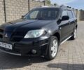 Чорний Міцубісі Аутлендер, об'ємом двигуна 2.4 л та пробігом 265 тис. км за 7000 $, фото 5 на Automoto.ua