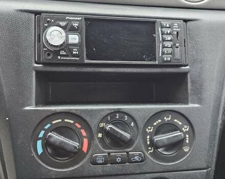 Чорний Міцубісі Аутлендер, об'ємом двигуна 2 л та пробігом 290 тис. км за 4200 $, фото 13 на Automoto.ua