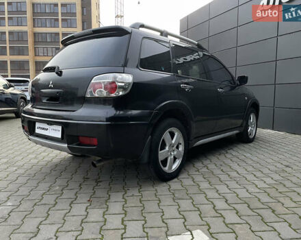 Черный Мицубиси Аутлендер, объемом двигателя 2.4 л и пробегом 248 тыс. км за 7300 $, фото 23 на Automoto.ua