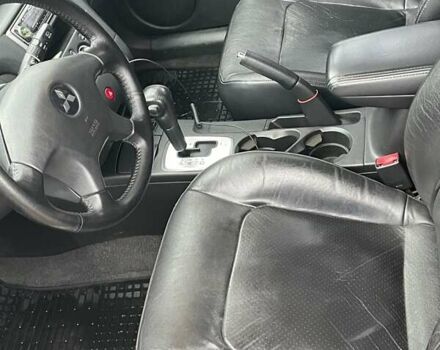 Чорний Міцубісі Аутлендер, об'ємом двигуна 2.4 л та пробігом 213 тис. км за 6850 $, фото 17 на Automoto.ua