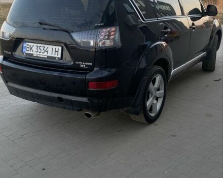 Чорний Міцубісі Аутлендер, об'ємом двигуна 2.4 л та пробігом 200 тис. км за 8300 $, фото 5 на Automoto.ua