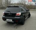 Черный Мицубиси Аутлендер, объемом двигателя 2.38 л и пробегом 319 тыс. км за 4800 $, фото 3 на Automoto.ua