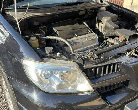 Черный Мицубиси Аутлендер, объемом двигателя 2.38 л и пробегом 118 тыс. км за 6850 $, фото 12 на Automoto.ua